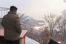 kcna-dec16-2022-highres-3k-kju-sohae-solid-fuel-rocket-engine-motor-test-stand-desk-observatio...jpg