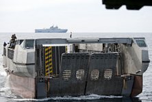 US_Navy_120207-N-YF306-086_A_French_landing_catamaran_(L-CAT)_pulls_into_the_well_deck_of_the_...jpg